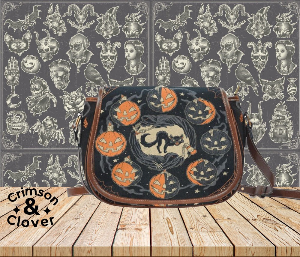 Pumpkin moon phase Saddle Bag