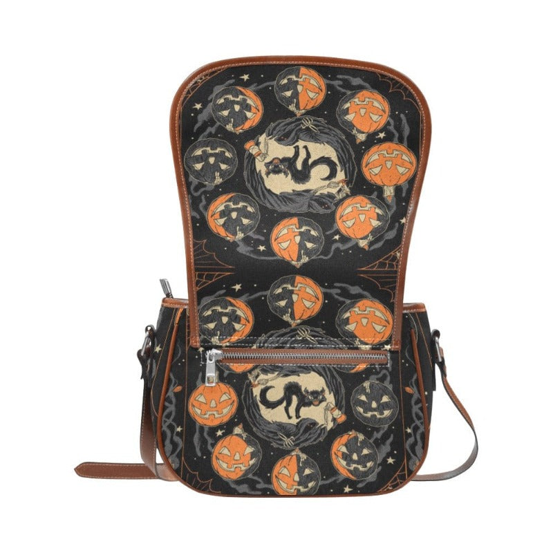 Pumpkin moon phase Saddle Bag